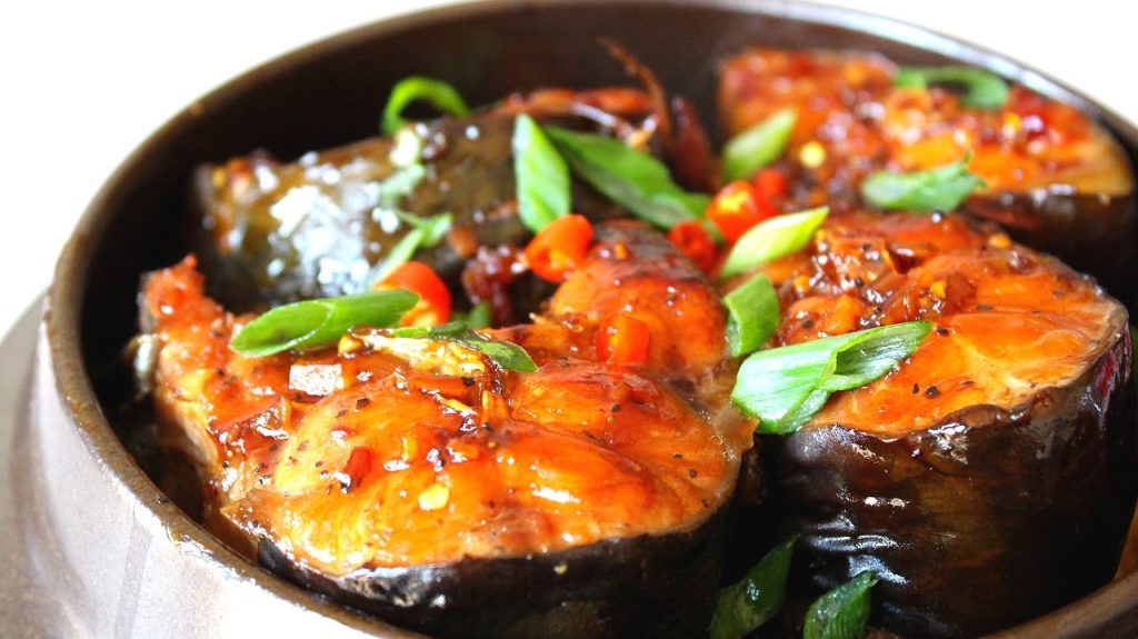 Caramelized fish in clay pots, a specialty of the Mekong Delta